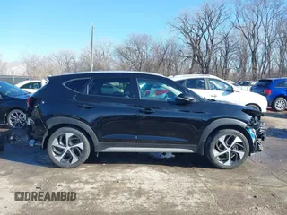 2018 Hyundai Tucson Sport with VIN KM8J33ALXJU771481, listed as a IAAI auction lot 41399335 with 64,905 mi miles. Bid and sale history available at carsss.com. Image 14.