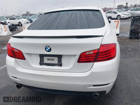 2014 BMW 5 Series 535i with VIN WBA5B1C57ED475963, listed as a IAAI auction lot 41914997 with 92,037 mi miles and . Bid and sale history available at DreamBid. Image 16.