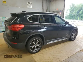 2018 BMW X1 xDrive28i with VIN WBXHT3C32J5F89449, listed as a Copart auction lot 64896595 with 108,804 mi miles and Clean title. Bid and sale history available at DreamBid. Image 3.