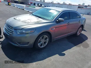 2013 Ford Taurus SEL with VIN 1FAHP2E89DG207904, listed as a IAAI auction lot 42184669 with 147,321 mi miles and . Bid and sale history available at carsss.com. Image 2.