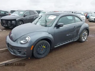 2018 Volkswagen Beetle SE with VIN 3VWJD7AT2JM710412, listed as a IAAI auction lot 41868455 with 1 mi miles. Bid and sale history available at carsss.com. Image 2.