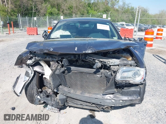 2014 Chrysler 300 z VIN 2C3CCAAG1EH212760, wystawiony jako IAAI lot #42139245 z przebiegiem 129 868 mil mil oraz . Historia ofert i sprzedaży dostępna na DreamBid. Obrazek 12.