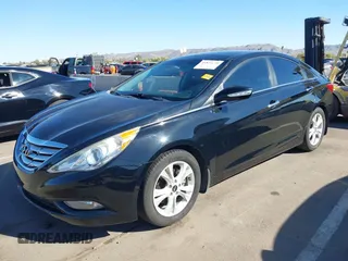 2012 Hyundai Sonata SE z VIN 5NPEC4AC6CH423122, wystawiony jako IAAI lot #41879178 z przebiegiem 64 681 mil mil oraz . Historia ofert i sprzedaży dostępna na DreamBid. Obrazek 2.