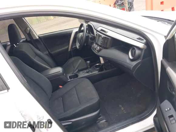 2018 Toyota RAV4 LE with VIN JTMBFREV8JJ722277, listed as a IAAI auction lot 42075684 with 203,458 mi miles and . Bid and sale history available at DreamBid. Image 5.