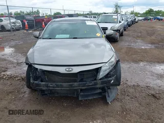 2013 Kia Optima SX z VIN 5XXGR4A65DG120332, wystawiony jako IAAI lot #42323216 z przebiegiem Nie podano mil oraz . Historia ofert i sprzedaży dostępna na DreamBid. Obrazek 12.
