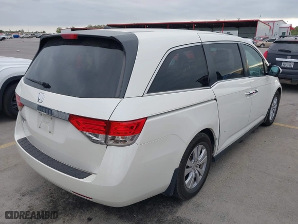 2016 Honda Odyssey EX-L with VIN 5FNRL5H68GB112223, listed as a IAAI auction lot 42056616 with 126,285 mi miles. Bid and sale history available at carsss.com. Image 4.