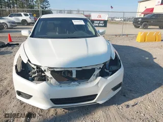 2016 Nissan Altima 2.5 SL with VIN 1N4AL3AP5GC262054, listed as a IAAI auction lot 41626450 with 147,226 mi miles. Bid and sale history available at carsss.com. Image 6.
