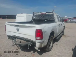 2021 Ram 1500 Tradesman with VIN 1C6RR6FG0MS524674, listed as a IAAI auction lot 42589113 with 95,899 mi miles and . Bid and sale history available at DreamBid. Image 4.