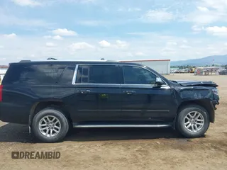 2016 Chevrolet Suburban LTZ with VIN 1GNSKJKC8GR408839, listed as a IAAI auction lot 42573413 with 168,537 mi miles and . Bid and sale history available at DreamBid. Image 14.