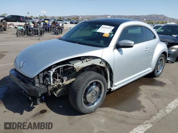 2013 Volkswagen Beetle 2.5L w/Sun/Sound/Nav with VIN 3VWJX7AT5DM606119, listed as a IAAI auction lot 41970253 with 81,004 mi miles and . Bid and sale history available at DreamBid. Image 2.