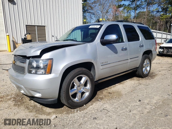 2013 Chevrolet Tahoe LTZ with VIN 1GNSCCE03DR374265, listed as a Copart auction lot 49290765 with 206,584 mi miles and Salvage title. Bid and sale history available at DreamBid. Image 1.