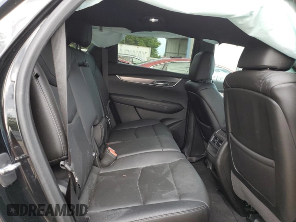 2023 Cadillac XT5 FWD Luxury z VIN 1GYKNAR40PZ106096, wystawiony jako Copart lot #80909074 z przebiegiem 19 677 mil mil oraz Nie do naprawy • Non repairable. Historia ofert i sprzedaży dostępna na DreamBid. Obrazek 11.