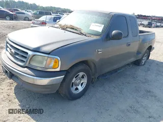 2003 Ford F-150 XL with VIN 2FTRX07W93CB11978, listed as a IAAI auction lot 42549547 with 209,486 mi miles and . Bid and sale history available at DreamBid. Image 2.