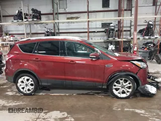 2016 Ford Escape Titanium with VIN 1FMCU9JX6GUB57497, listed as a IAAI auction lot 41375019 with 1 mi miles. Bid and sale history available at carsss.com. Image 13.