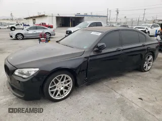 2013 BMW 7 Series 740Li with VIN WBAYE4C51DD137687, listed as a Copart auction lot 76103944 with 134,609 mi miles and Salvage title. Bid and sale history available at DreamBid. Image 1.