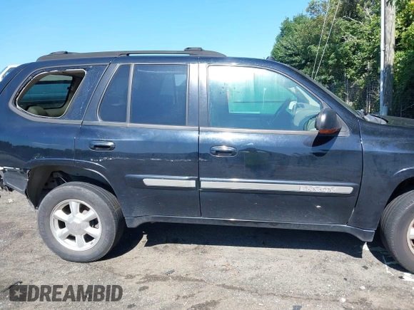 2005 GMC Envoy SLE with VIN 1GKDS13S452208252, listed as a IAAI auction lot 42357457 with 197,419 mi miles and . Bid and sale history available at DreamBid. Image 13.
