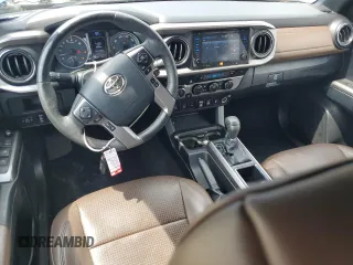 2018 Toyota Tacoma SR z VIN 3TMGZ5AN5JM148719, wystawiony jako Copart lot #56621065 z przebiegiem 34 433 mil mil oraz Szkoda całkowita • Salvage title. Historia ofert i sprzedaży dostępna na DreamBid. Obrazek 8.