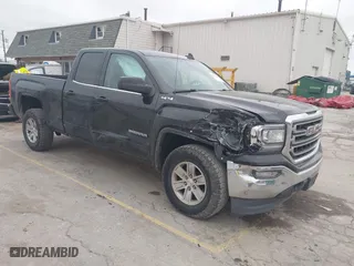 2016 GMC Sierra 1500 SLE with VIN 1GTV2MEC1GZ246409, listed as a IAAI auction lot 41023009 with 90,802 mi miles. Bid and sale history available at carsss.com. Image 1.