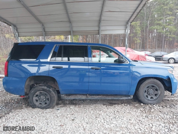 2015 Chevrolet Tahoe Commercial with VIN 1GNSK2EC1FR663199, listed as a IAAI auction lot 41552787 with 148,187 mi miles. Bid and sale history available at carsss.com. Image 13.