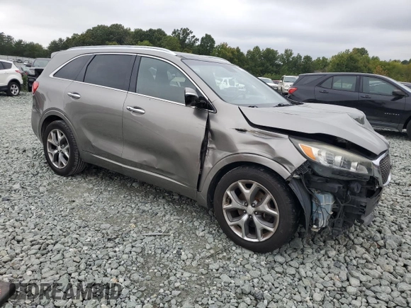 2016 Kia Sorento SXL with VIN 5XYPK4A14GG059158, listed as a Copart auction lot 72459954 with 264,218 mi miles and Salvage Title. Bid and sale history available at carsss.com. Image 4.