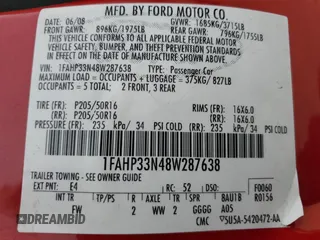 2008 Ford Focus SE with VIN 1FAHP33N48W287638, listed as a Copart auction lot 45018935 with 134,741 mi miles and Salvage Title. Bid and sale history available at carsss.com. Image 13.