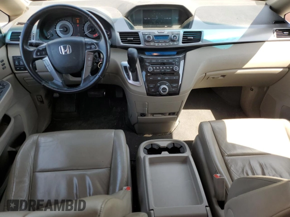 2011 Honda Odyssey Touring Elite with VIN 5FNRL5H9XBB030061, listed as a Copart auction lot 55067775 with 142,245 mi miles and Clean Title. Bid and sale history available at DreamBid. Image 8.