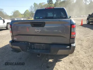 2022 Nissan Frontier SV with VIN 1N6ED1EJ1NN676305, listed as a Copart auction lot 50247215 with 56,252 mi miles and Salvage title. Bid and sale history available at DreamBid. Image 6.