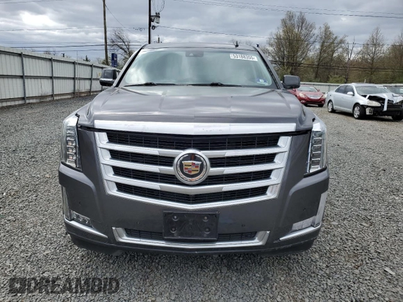 2015 Cadillac Escalade Luxury z VIN 1GYS4BKJXFR238094, wystawiony jako Copart lot #53188355 z przebiegiem Nie podano mil oraz Szkody całkowita. Historia ofert i sprzedaży dostępna na DreamBid. Obrazek 5.