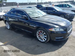 2012 Jaguar XJ with VIN SAJWA1CB0CLV32007, listed as a IAAI auction lot 41550036 with 136,486 mi miles and . Bid and sale history available at DreamBid. Image 1.