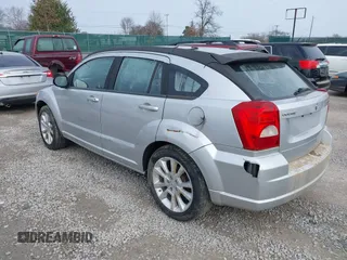 2011 Dodge Caliber Heat with VIN 1B3CB5HA0BD237473, listed as a IAAI auction lot 41690622 with 205,961 mi miles and . Bid and sale history available at DreamBid. Image 3.