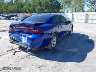 2018 Dodge Charger SXT with VIN 2C3CDXBG4JH164440, listed as a IAAI auction lot 40878429 with 118,449 mi miles. Bid and sale history available at carsss.com. Image 4.