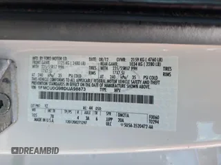 2013 Ford Escape SE with VIN 1FMCU0G98DUA98873, listed as a Copart auction lot 61253725 with 140,534 mi miles and Clean title. Bid and sale history available at DreamBid. Image 12.