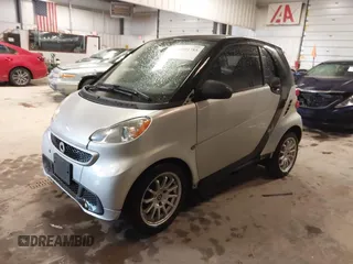 2014 Smart fortwo Pure with VIN WMEEJ3BA1EK728739, listed as a IAAI auction lot 41911785 with 120,688 mi miles and . Bid and sale history available at DreamBid. Image 2.