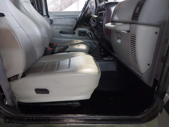 1998 Jeep Wrangler SE with VIN 1J4FY29P2WP733255, listed as a IAAI auction lot 41554602 with 157,316 mi miles. Bid and sale history available at carsss.com. Image 5.