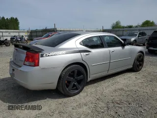 2009 Dodge Charger SE z VIN 2B3KA43D89H613585, wystawiony jako Copart lot #56076215 z przebiegiem 174 911 mil mil oraz Czysty tytuł • Clean title. Historia ofert i sprzedaży dostępna na DreamBid. Obrazek 3.
