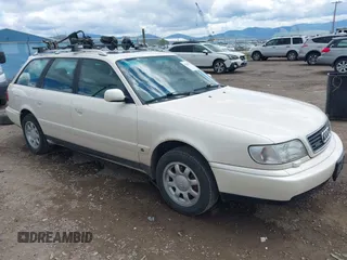 1996 Audi A6 z VIN WAUJA84A9TN106938, wystawiony jako IAAI lot #42287751 z przebiegiem 163 427 mil mil oraz . Historia ofert i sprzedaży dostępna na DreamBid. Obrazek 1.