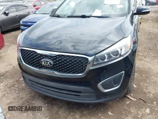 2016 Kia Sorento LX with VIN 5XYPGDA5XGG168325, listed as a IAAI auction lot 42123471 with 267,254 mi miles. Bid and sale history available at carsss.com. Image 12.