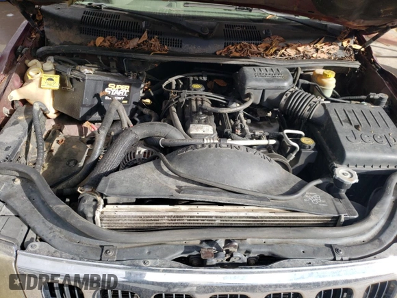 2002 Jeep Grand Cherokee Laredo с VIN 1J4GX48S02C257582, выставлен на аукционе Copart как лот 88787515 с пробегом Не указан миль и Списание • Salvage title. История ставок и продаж доступна на DreamBid. Изображение 12.