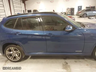 2015 BMW X1 xDrive28i with VIN WBAVL1C57FVY35998, listed as a IAAI auction lot 41740072 with 84,233 mi miles. Bid and sale history available at carsss.com. Image 12.