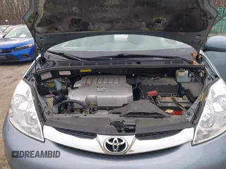 2008 Toyota Sienna XLE with VIN 5TDZK22C18S102498, listed as a IAAI auction lot 41623508 with 214,485 mi miles. Bid and sale history available at carsss.com. Image 10.