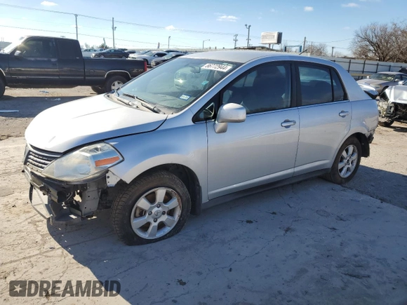 2009 Nissan Versa 1.8 S with VIN 3N1BC11E29L372166, listed as a Copart auction lot 86772944 with 0 mi miles and Salvage Title. Bid and sale history available at carsss.com. Image 1.
