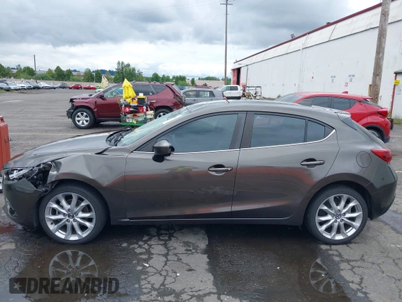 2014 Mazda 3 S Grand Touring with VIN JM1BM1M3XE1164610, listed as a IAAI auction lot 42421946 with 96,591 mi miles and . Bid and sale history available at DreamBid. Image 14.