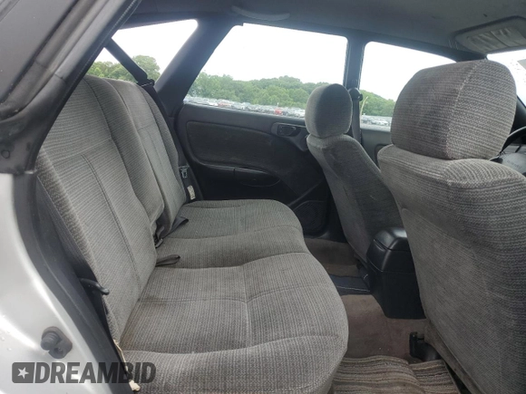 1998 Subaru Legacy L with VIN 4S3BK435XW6316402, listed as a Copart auction lot 60301805 with 288,744 mi miles and Salvage title. Bid and sale history available at DreamBid. Image 11.
