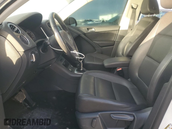 2017 Volkswagen Tiguan S with VIN WVGAV7AX3HK039090, listed as a Copart auction lot 60723615 with 72,311 mi miles and Salvage title. Bid and sale history available at DreamBid. Image 7.