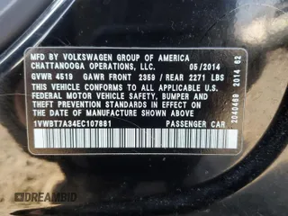 2014 Volkswagen Passat SE with VIN 1VWBT7A34EC107881, listed as a Copart auction lot 65431345 with 106,432 mi miles and Salvage title. Bid and sale history available at DreamBid. Image 12.