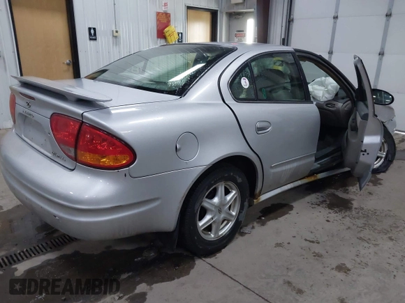 2003 Oldsmobile Alero GL1 z VIN 1G3NL52F53C112582, wystawiony jako IAAI lot #41926039 z przebiegiem 124 769 mil mil oraz . Historia ofert i sprzedaży dostępna na DreamBid. Obrazek 4.