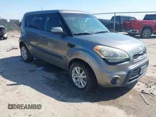 2012 Kia Soul + with VIN KNDJT2A69C7386679, listed as a IAAI auction lot 41969598 with 319,595 mi miles. Bid and sale history available at carsss.com. Image 1.