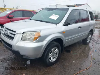 2007 Honda Pilot LX with VIN 2HKYF18157H530370, listed as a IAAI auction lot 41967033 with 214,590 mi miles and . Bid and sale history available at DreamBid. Image 17.