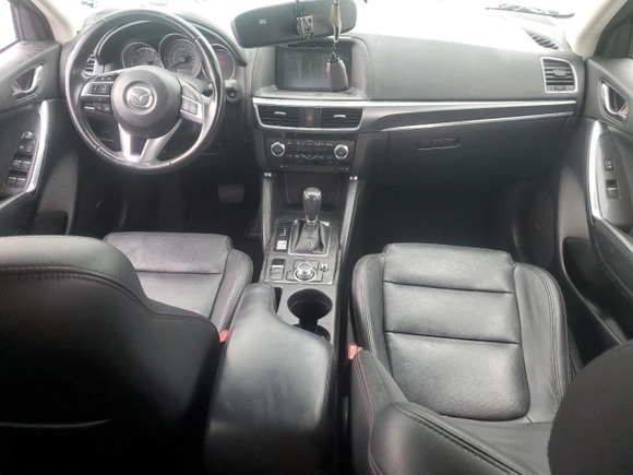 2016 Mazda CX-5 Grand Touring with VIN JM3KE4DYXG0711367, listed as a Copart auction lot 52862405 with 87,870 mi miles and Salvage Title. Bid and sale history available at DreamBid. Image 8.
