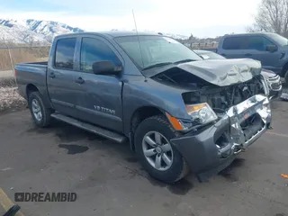 2014 Nissan Titan Pro-4X with VIN 1N6BA0EC3EN514358, listed as a IAAI auction lot 41636363 with 166,201 mi miles and . Bid and sale history available at DreamBid. Image 1.
